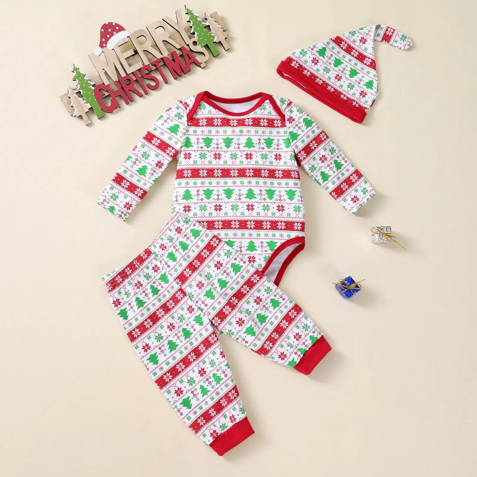 Baby Christmas tree print long-sleeve bodysuit, pants, and hat three-piece outfit on a white background