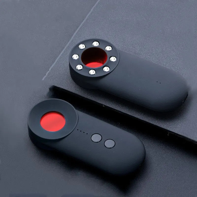 Black handheld GPS and hidden camera detector with USB port on a compact ABS plastic body.