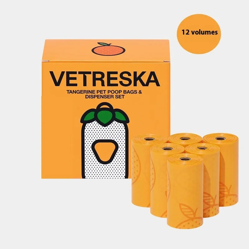Portable dog poop bag dispenser capsule with scented waste bags in strawberry, orange and cherry blossom designs