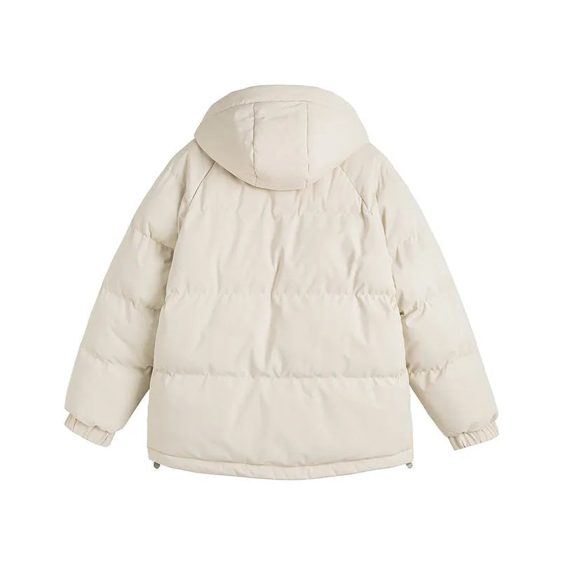 Beige loose fake cotton-padded winter jacket with side seam pockets on a mannequin.