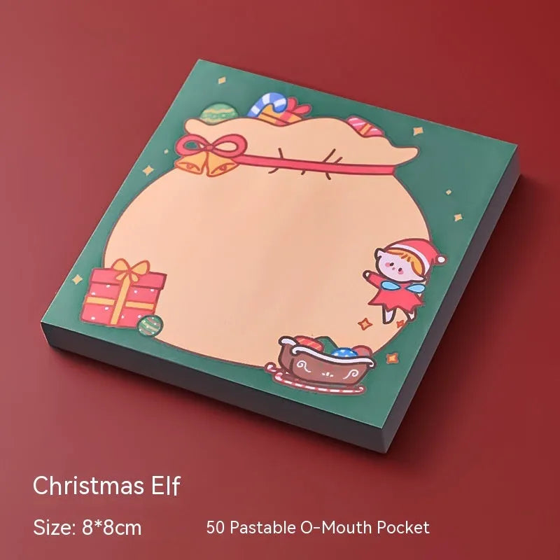 Christmas sticky notes book showing eight festive designs including elf, Santa, snowman, gift, house, bear, crystal ball, and sled