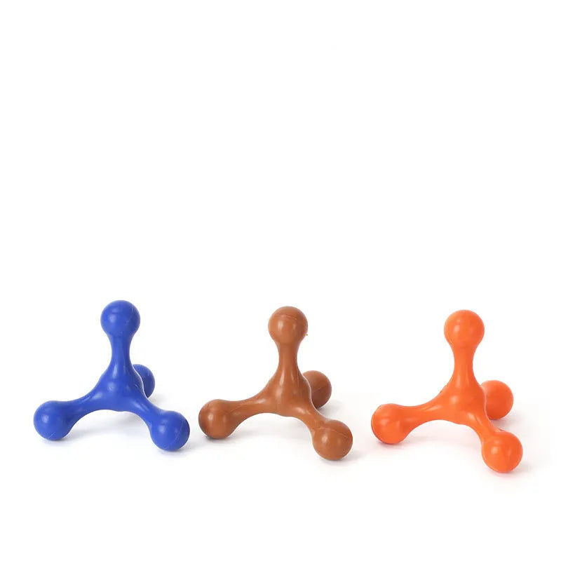 Blue silicone puppy chew toy shaped like a bone with three legs on a white background.