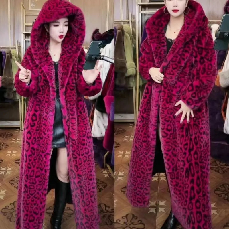 Long brown leopard print faux fur coat on a model, showing its loose fit and 100cm length.