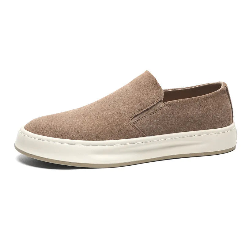 Men's casual shoes in solid grey colour with round toe, mid heel, and sewing line detail