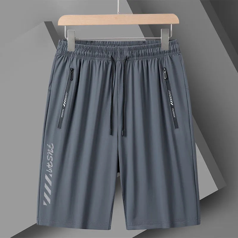 Men's black nylon quick-drying sports shorts with loose fit and elastic waistband.