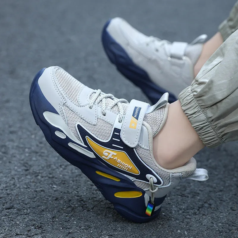 Boys' dark blue and beige PU mesh sports running shoes with Velcro strap and platform sole.