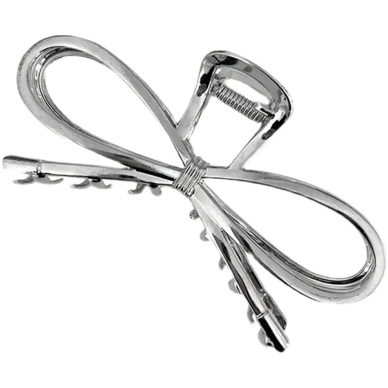 Alloy bow barrette for women Korean style hair grip in silver finish with manual polish