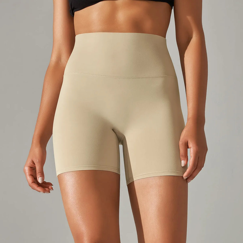 High waist hip lift fitness pants for women in black with belly control and moisture wicking