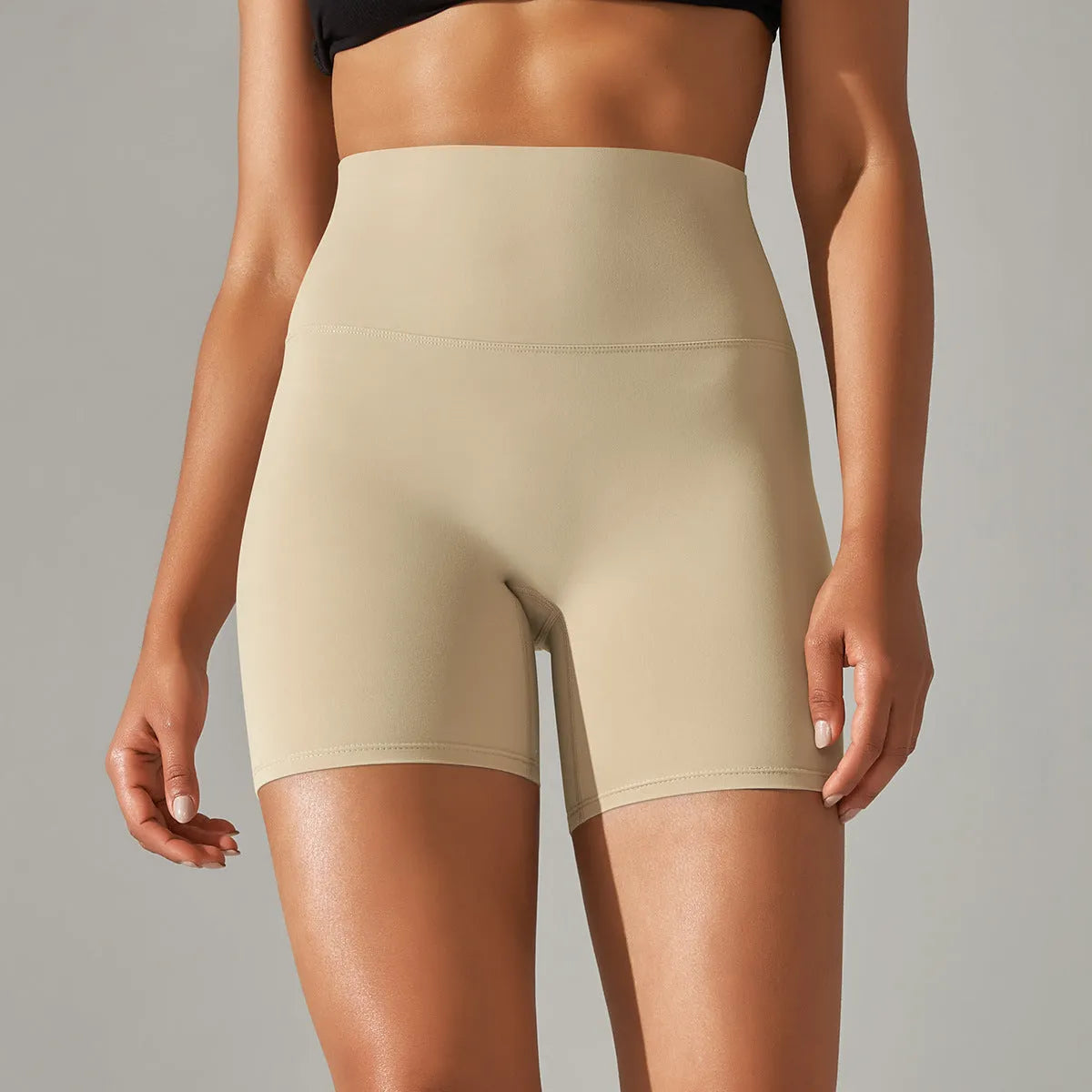 High waist hip lift fitness pants for women in black with belly control and moisture wicking