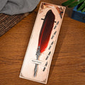 Vintage feather dip pen in ten colours with zinc alloy casing measuring 30×13×4 cm