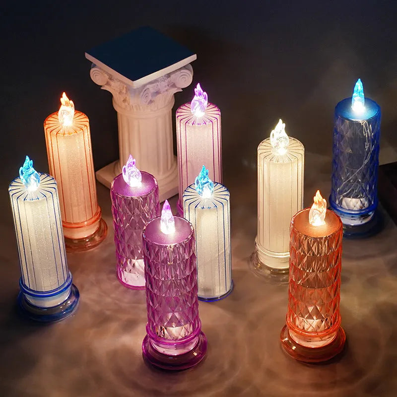 LED electronic candle lamp in ABS plastic with diamond style pattern, transparent colour, shown with base