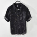 Men's black and white loose fit short-sleeved polo shirt with lapel collar on hanger