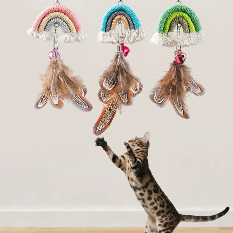 Blue feather rope cat toy with elastic cord hanging from door with sticky buckle clamp