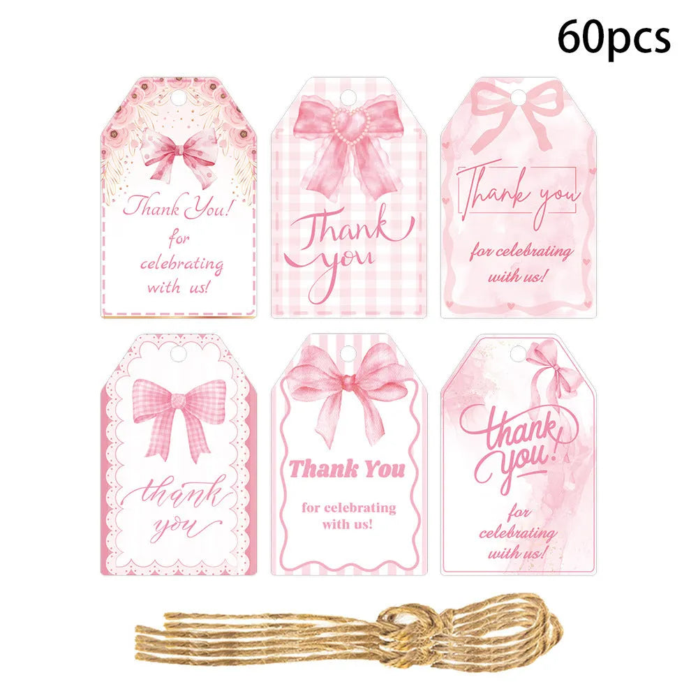 Bowknot-shaped paper gift tags with natural hemp rope ties for birthday party decoration