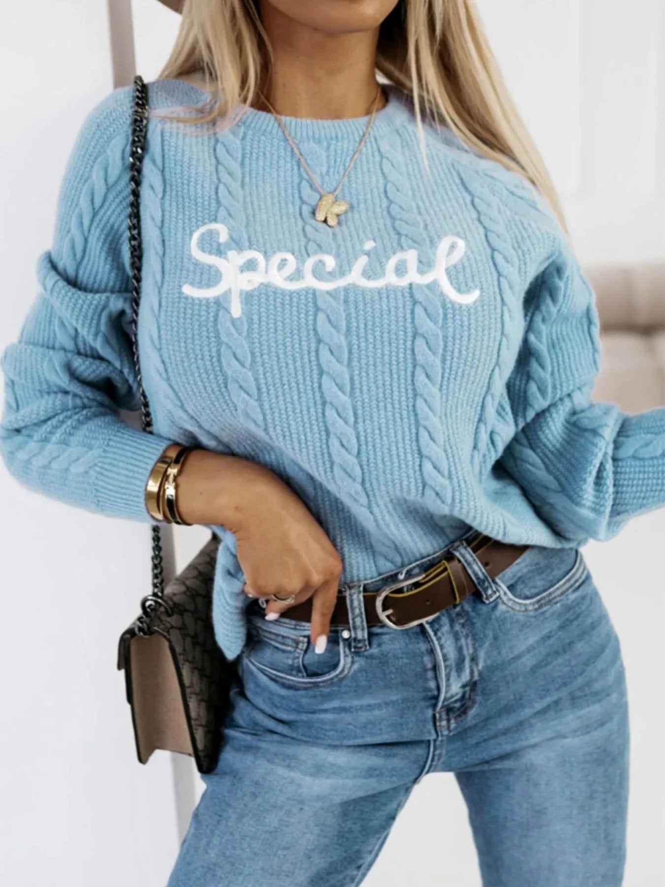 Blue men's leisure pullover sweater with embroidered letters text design on chest