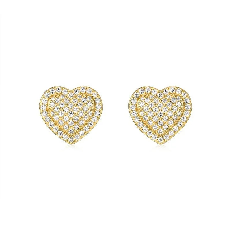 Gold-coloured heart-shaped moissanite stud earrings made from S925 silver on a plain background.