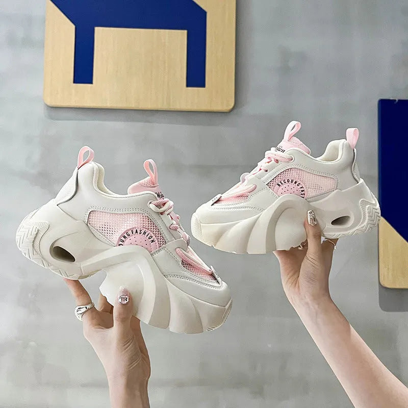 Women's thick sole sneakers with crossover strap detail in pink, black, and beige colour options