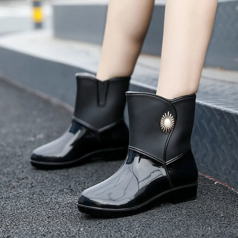 Women's middle tube non-slip rain boots in purple, black, and beige PVC with thickened construction for warmth