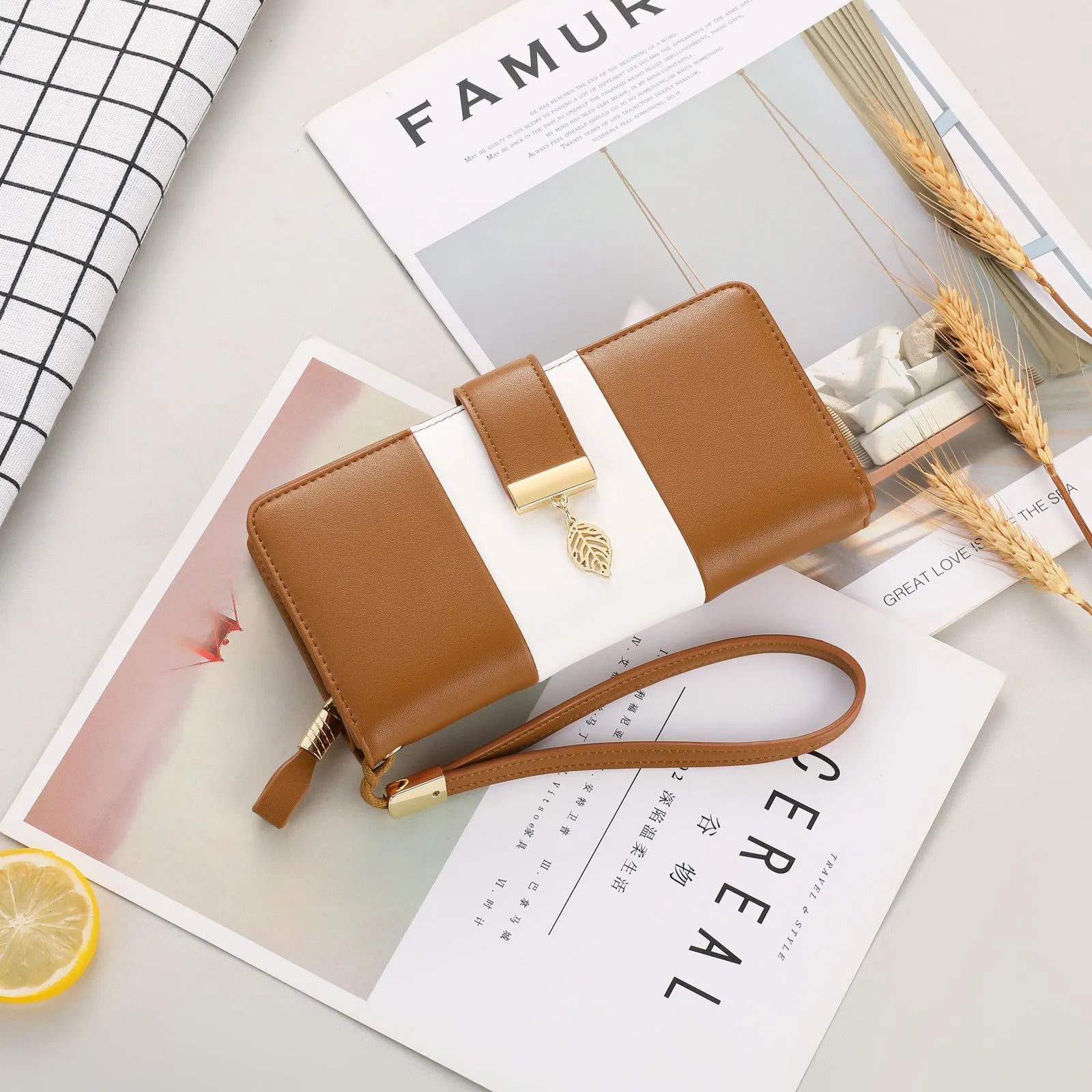 Anti-theft RFID clutch bag with locking clasp in black PU leather showing foldable design