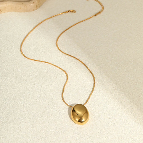 18K gold-plated geometric pendant on an adjustable stainless steel necklace chain.