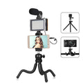 Black Octopus Tripod Live Broadcast Kit with flexible legs, fill light, and microphone on a table