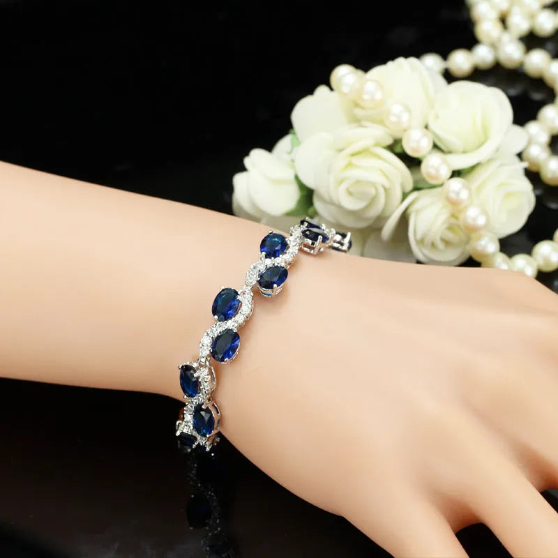 Copper plated gold geometric bracelet with micro inlaid AAA zircon stones, total length 18.4 cm.