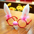 Christmas glasses frame in Santa Claus style with plastic frame and fabric details, 14.5cm by 5cm, on red background