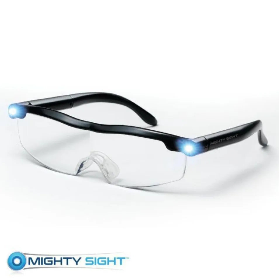 Transparent black USB LED reading glasses with on-frame light.