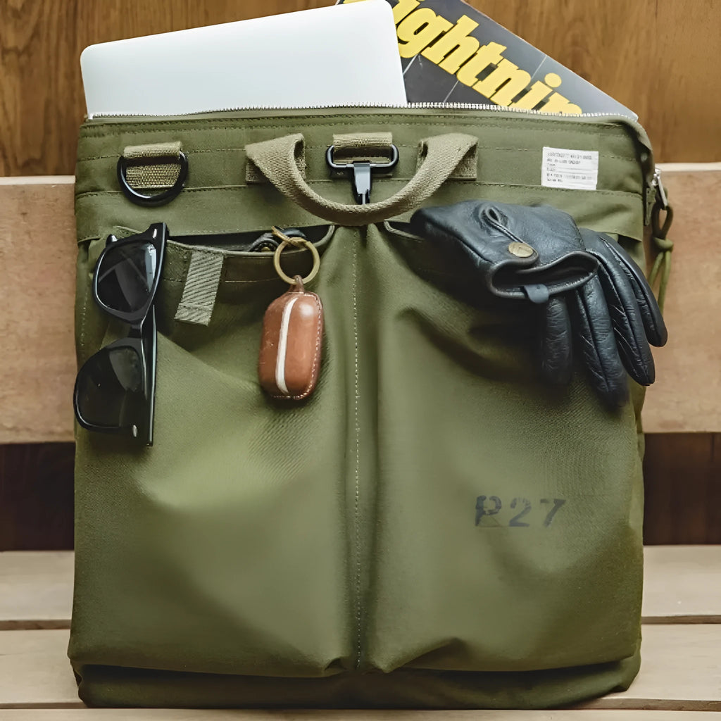 Canvas messenger bag in military green with shoulder strap and laptop compartment
