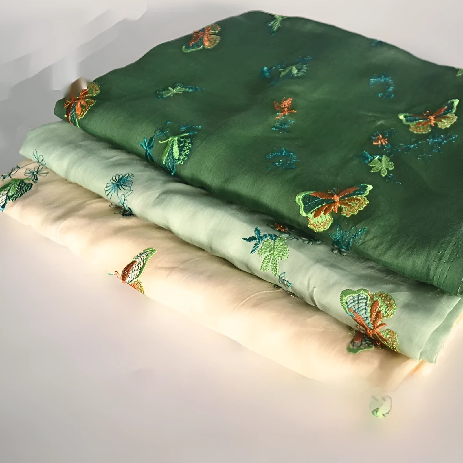 Pure ramie embroidery cloth for hanfu making showing beige, grass green, and dark green colour options