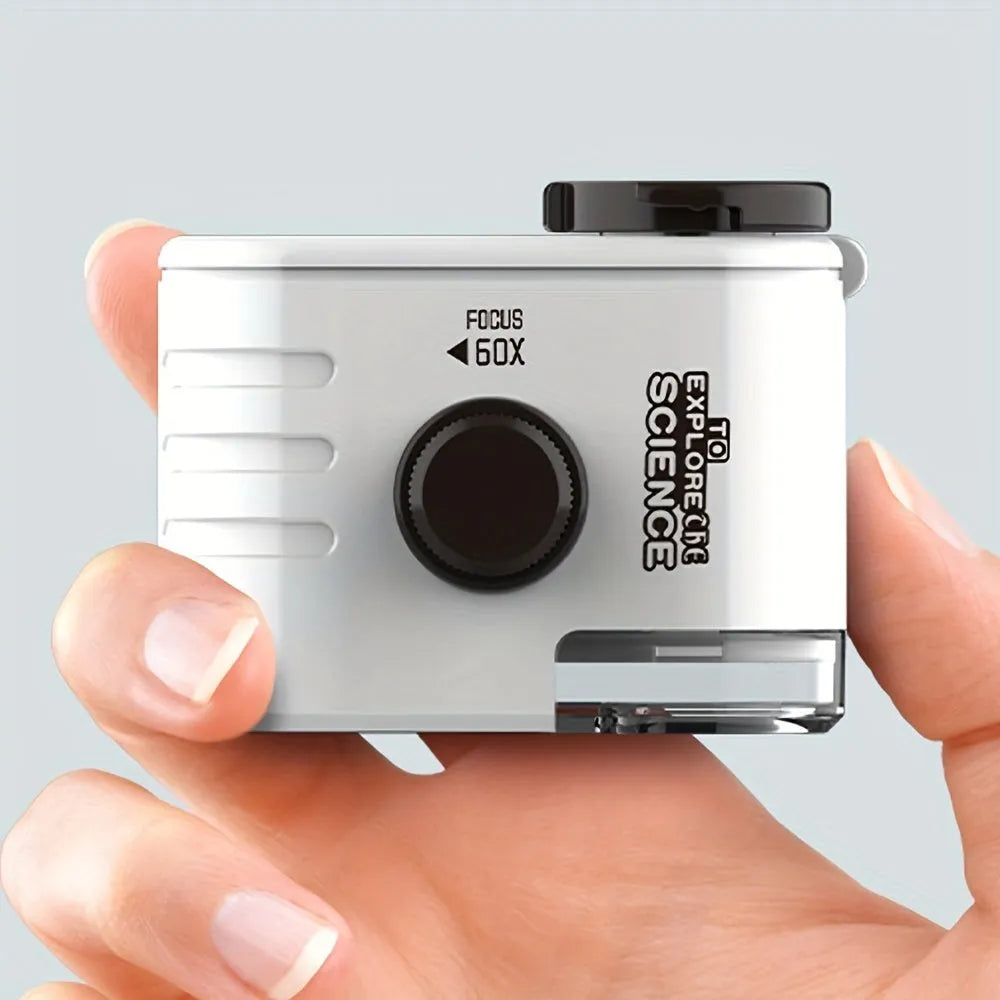 Mini mobile phone microscope with 60x magnification, LED light, and universal clip attached to a smartphone camera