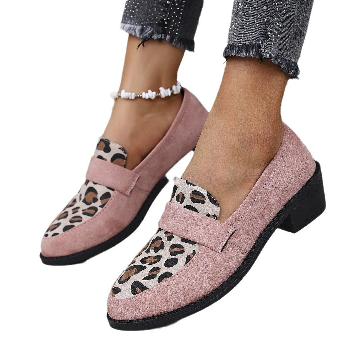 Women's brown leopard print suede slip-on shoes with chunky mid-heel and pointed toe on a white background.