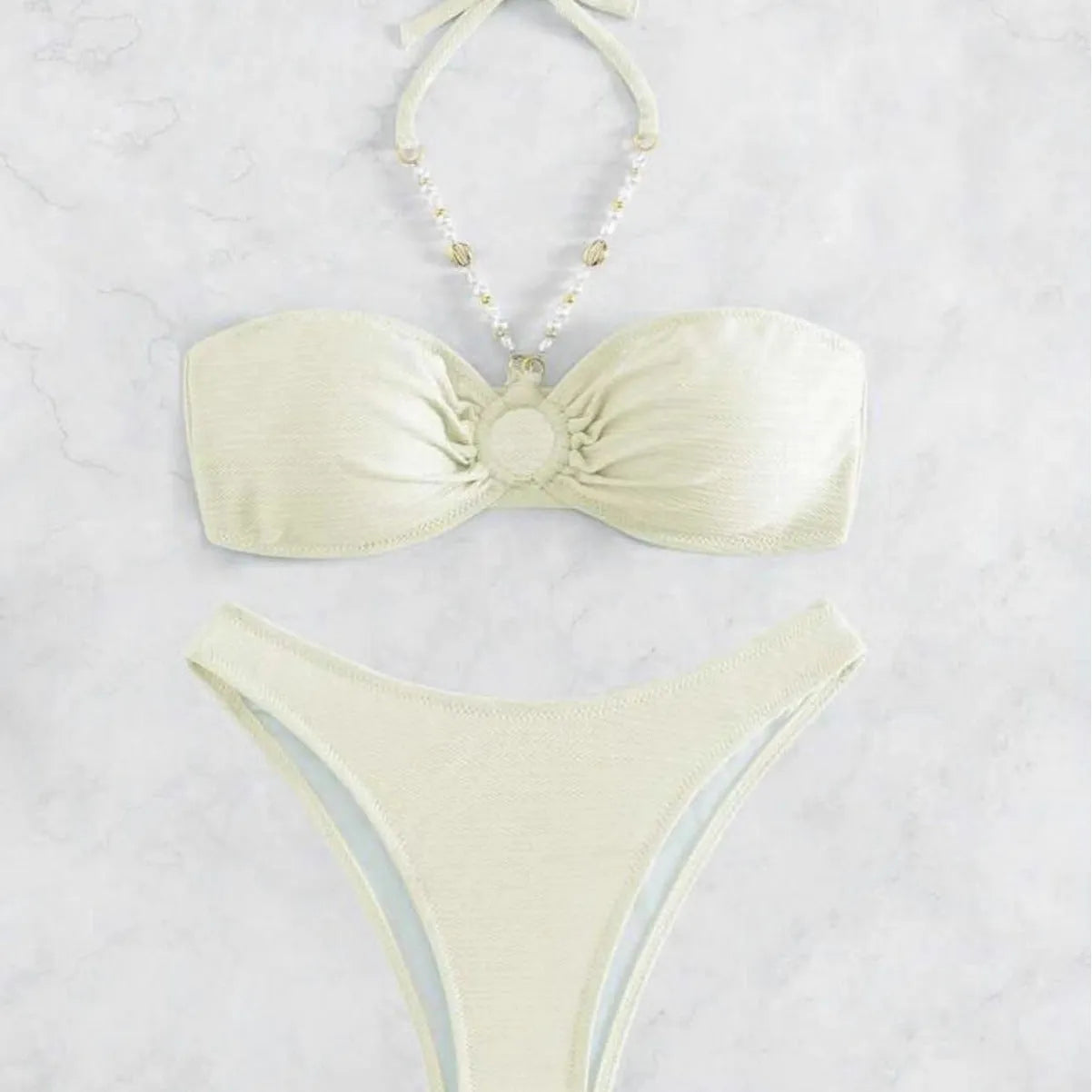 Women's halter bikini set in solid creamy-white colour with polyester spandex fabric