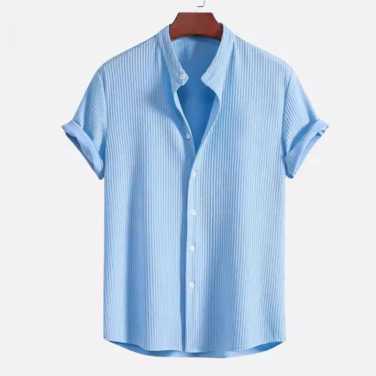 Men's loose short sleeve summer shirt in polyester available in multiple colours.