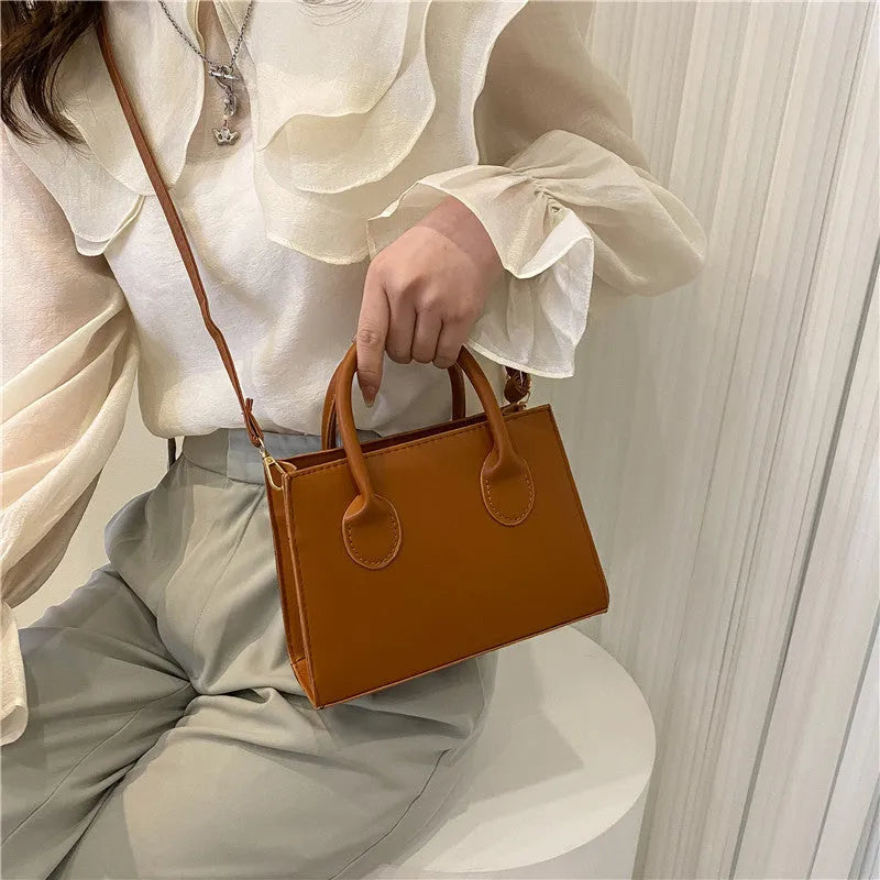 Retro casual PU small square bag for women with sewing line detail, five colour options, horizontal shape, crossbody strap