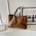 Soft polyester large tote shoulder bag in horizontal square shape with zippered pocket.