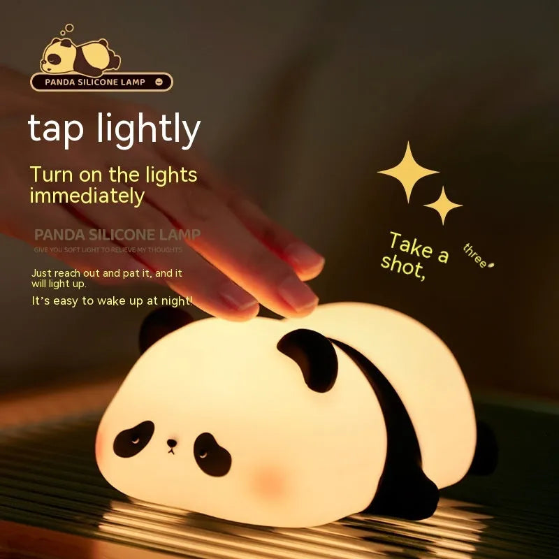 Panda shaped night light with silicone construction showing clap activation feature and USB charging port