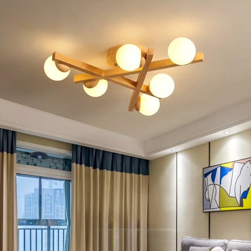 Nordic style wooden ceiling lamp with three light heads emitting neutral colour illumination