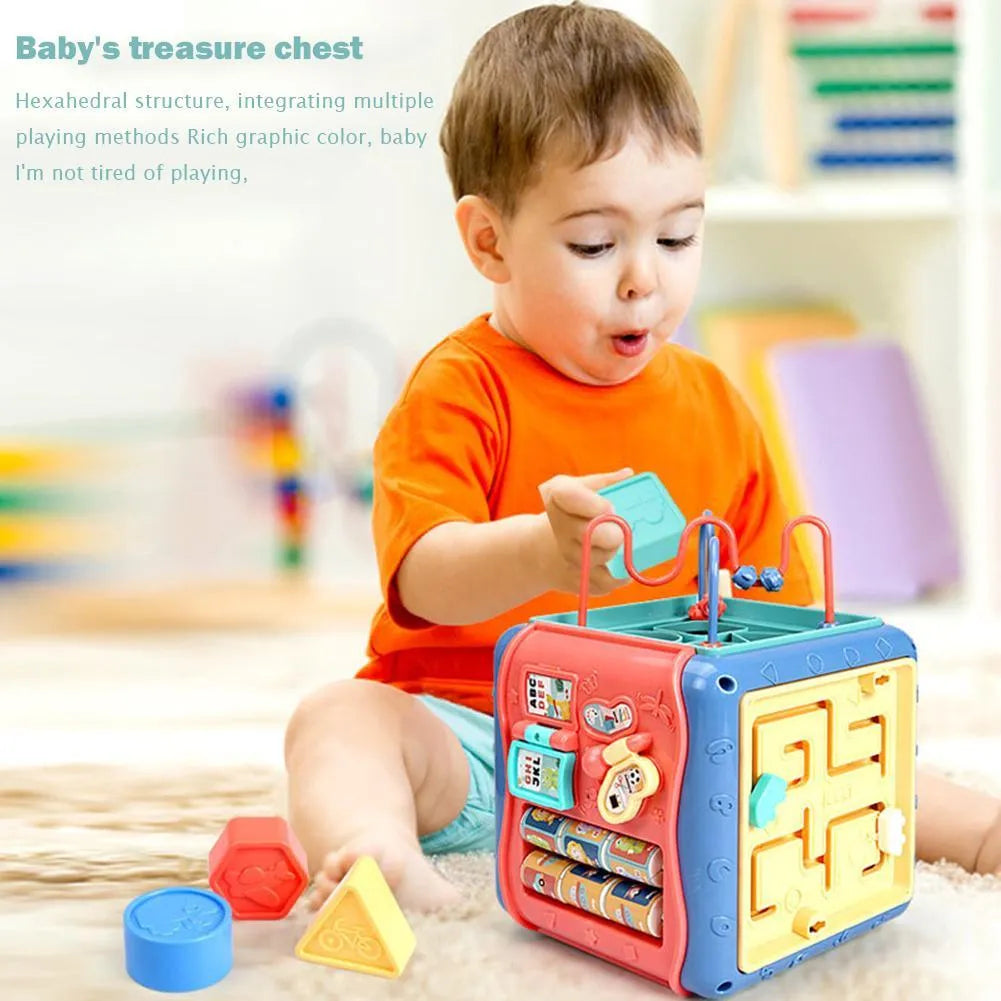 Six-sided educational cube toy with multiple activity panels including bead maze and shape puzzles