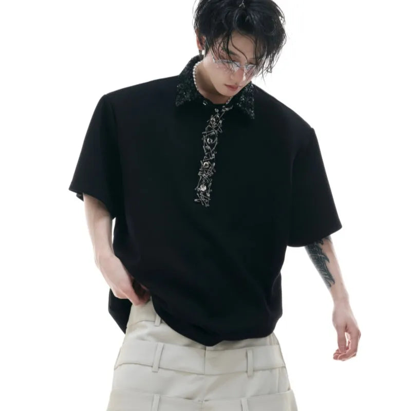 Men's black polo shirt with square collar, short sleeves, and embroidery and sequin detailing