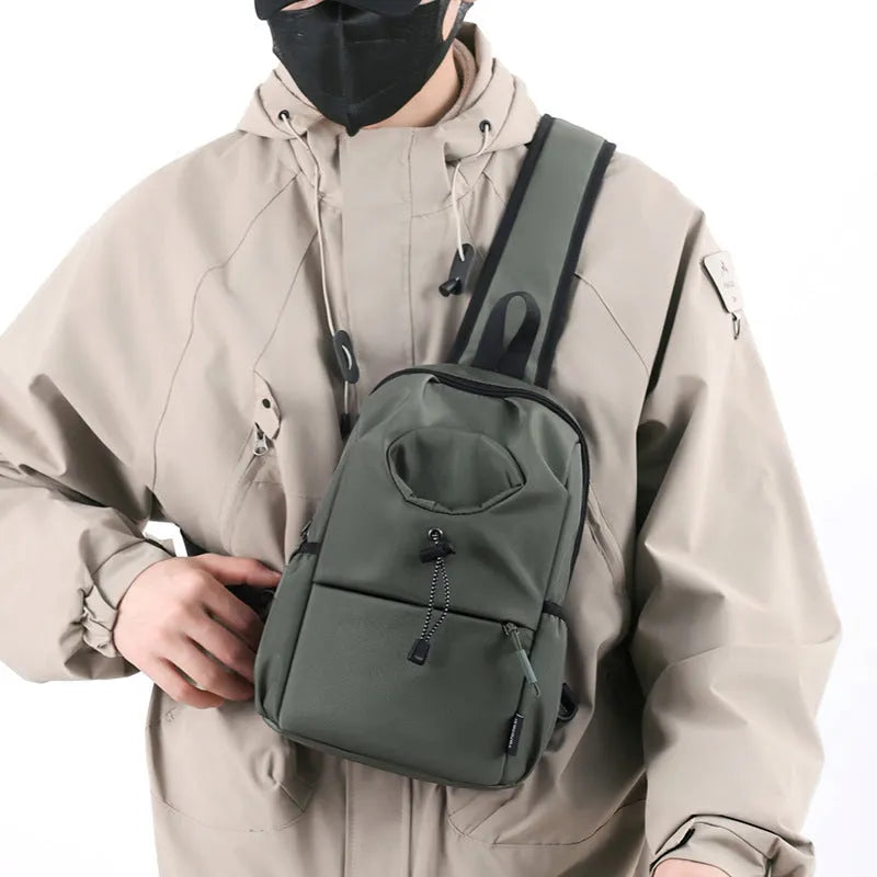 Oxford cloth waterproof shoulder chest bag for men in black with stitching detail