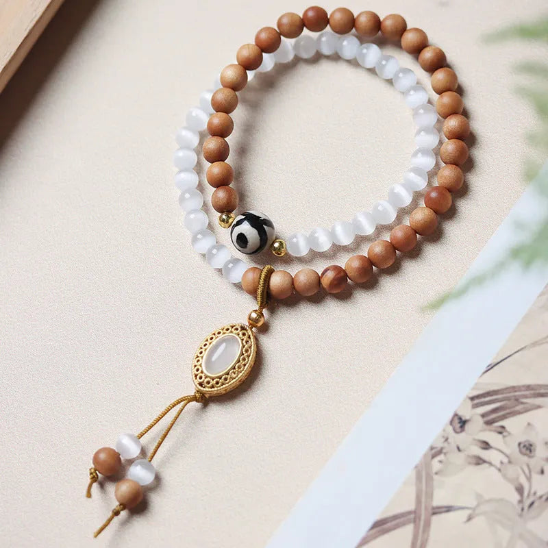 Barbie sandalwood double circle opal Tibetan bead bracelet with polished finish