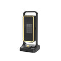 Black PTC ceramic desktop air heater with knob control on wooden surface