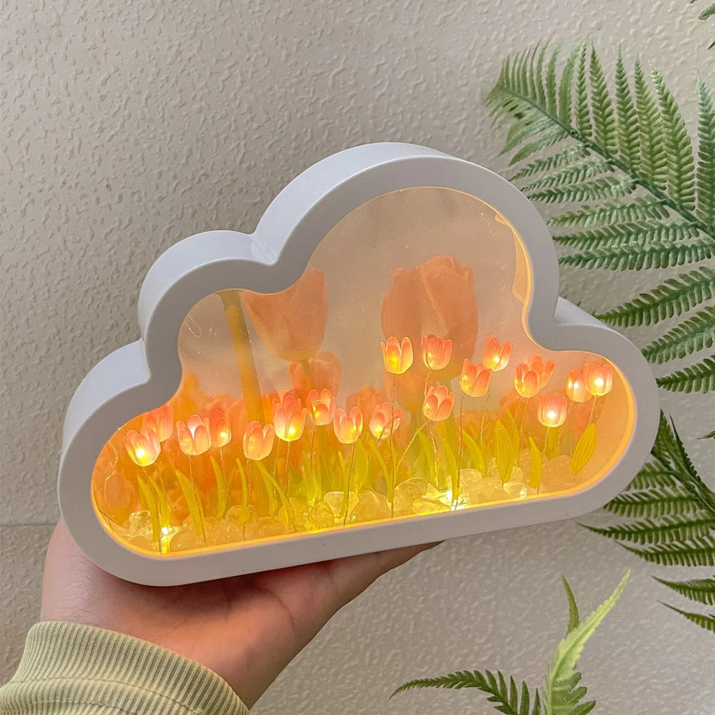 Tulip night lamp DIY kit with pink tulip LED light and mirror surface on a wooden desk