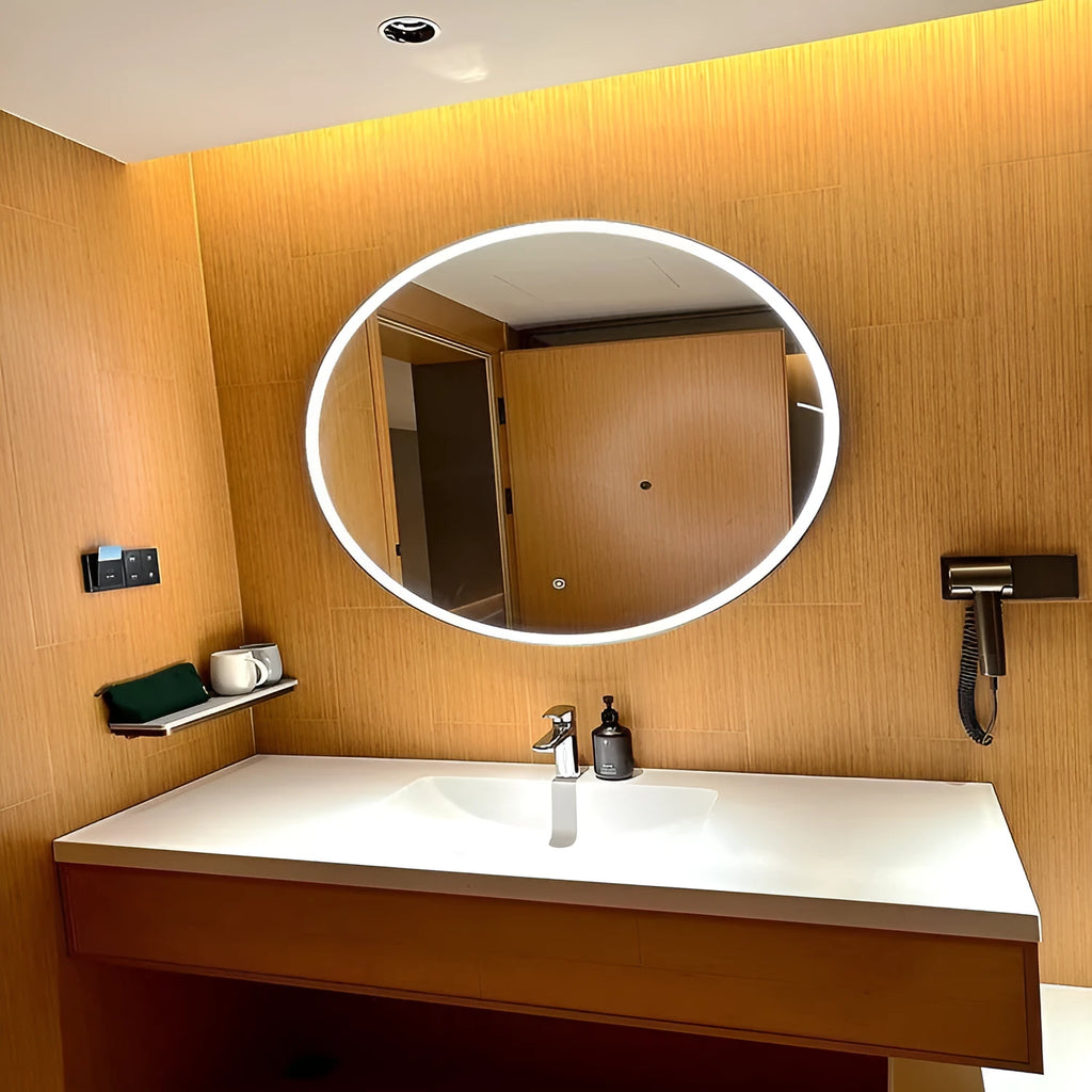 Round black aluminium framed LED bathroom mirror with touch controls for adjustable lighting