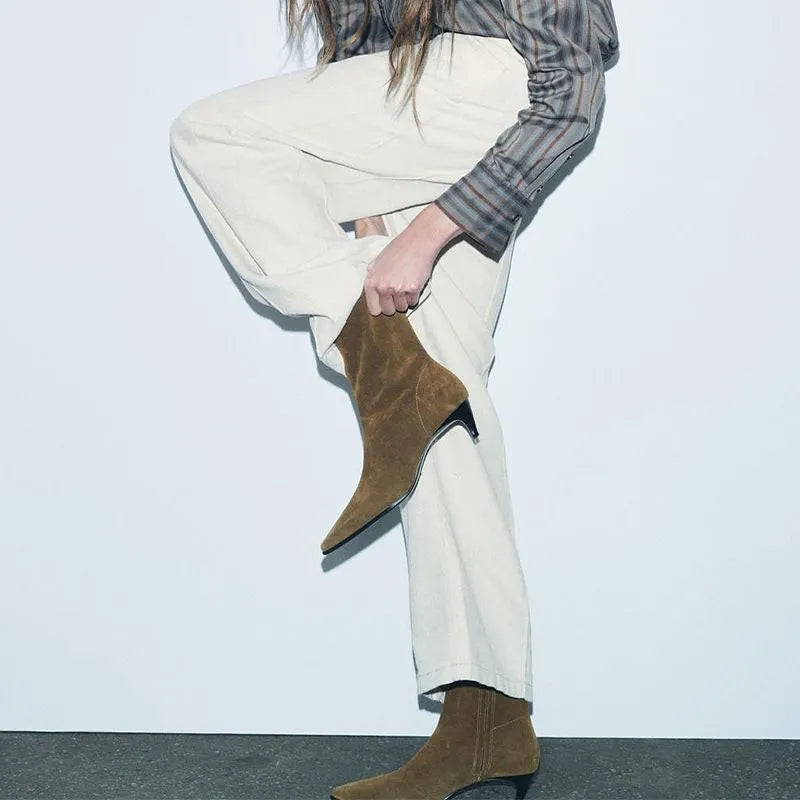 Brown women's square toe mid-calf boots with a side zipper and a low kitten heel on a waterproof platform sole.