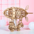 Wooden 3D puzzle model of a balloon assembled from pre-cut wood pieces on a light background