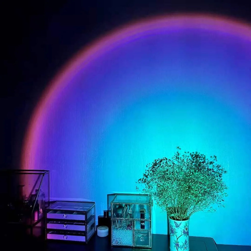 USB rechargeable sunset projection lamp showing rainbow and sun colour patterns