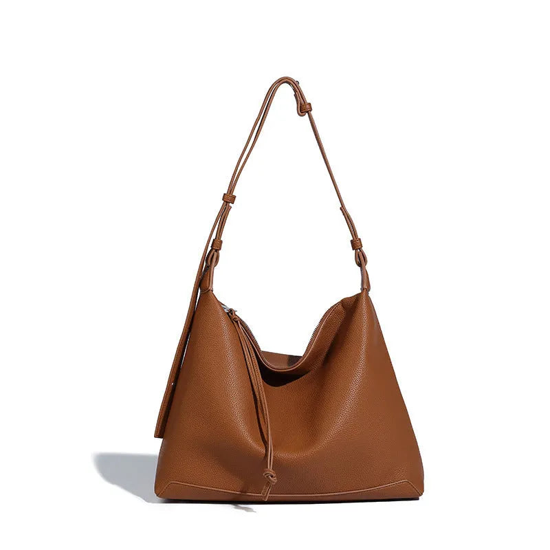 Large capacity underarm shoulder messenger bag in caramel PU leather, 36cm length, with soft texture