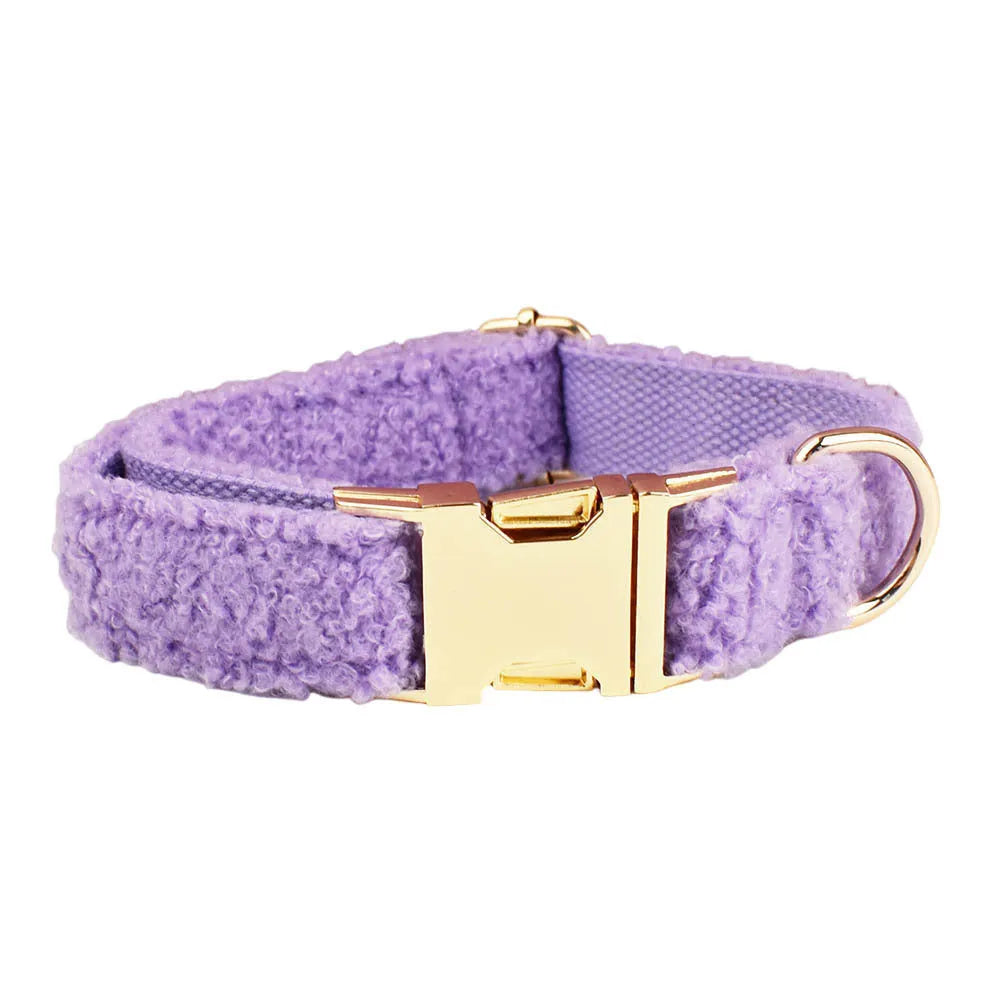 Purple cloth dog collar, leash, bow and vest four-piece set for small dogs on white background